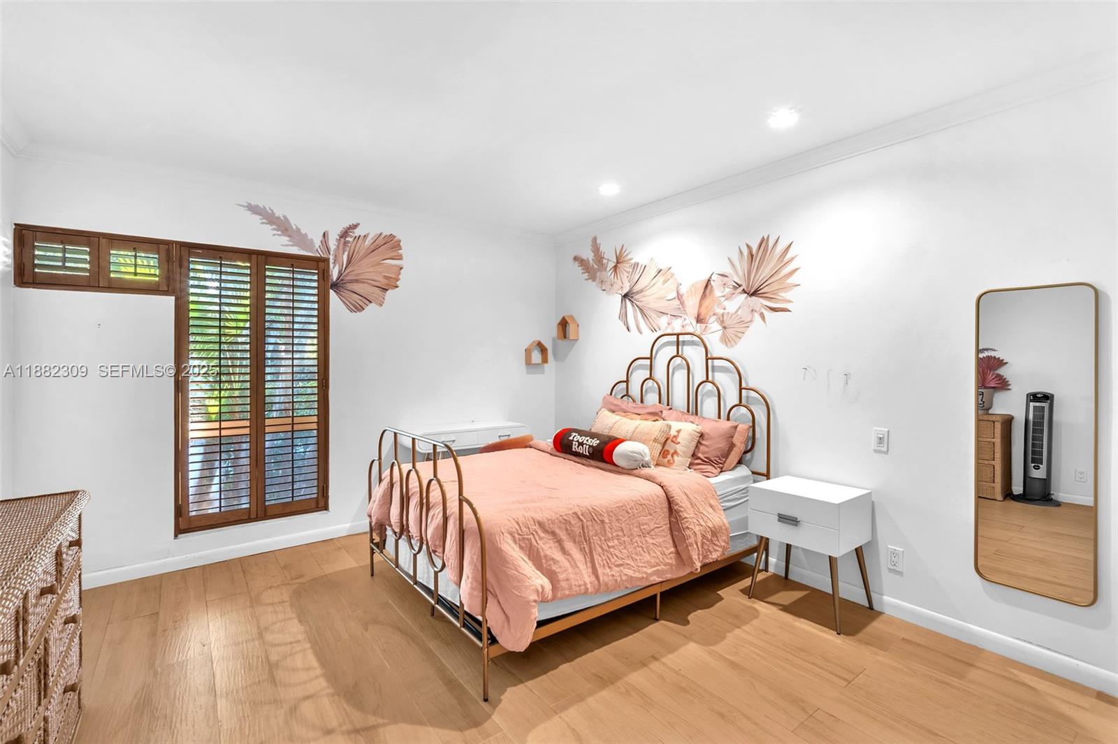 4401 Sanders Street Hollywood, FL 33021 - Photo 7 of 71 a bedroom with a bed and wooden floor