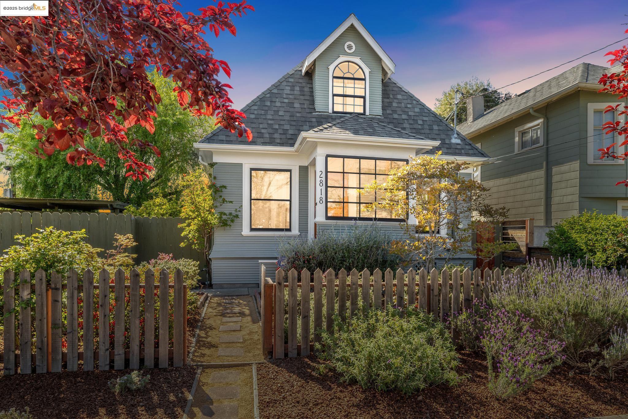 2818 Ninth Street Berkeley, CA 94710 - Photo 1 of 1 a front view of a house with a garden