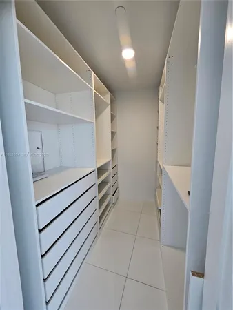a bathroom with a sink a mirror and a toilet