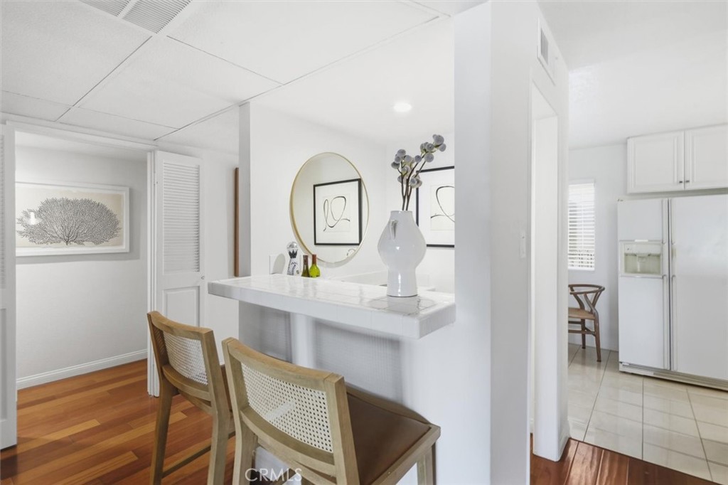 222 7th Street, Unit 202 Santa Monica, CA 90402 - Photo 11 of 41 a view of a dining room with furniture and wooden floor