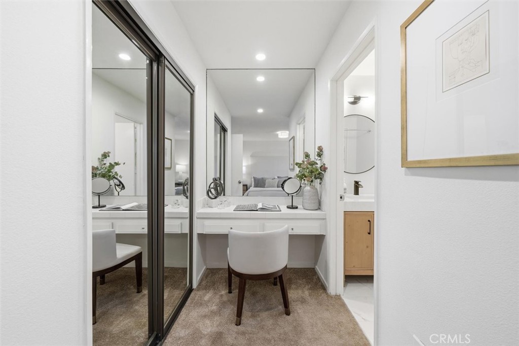 222 7th Street, Unit 202 Santa Monica, CA 90402 - Photo 28 of 41 a bathroom with a sink a mirror and a bathtub