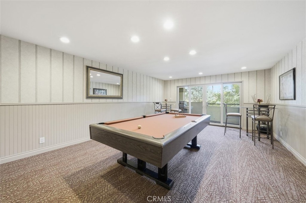 222 7th Street, Unit 202 Santa Monica, CA 90402 - Photo 35 of 41 a room with furniture pool table wooden floor and windows