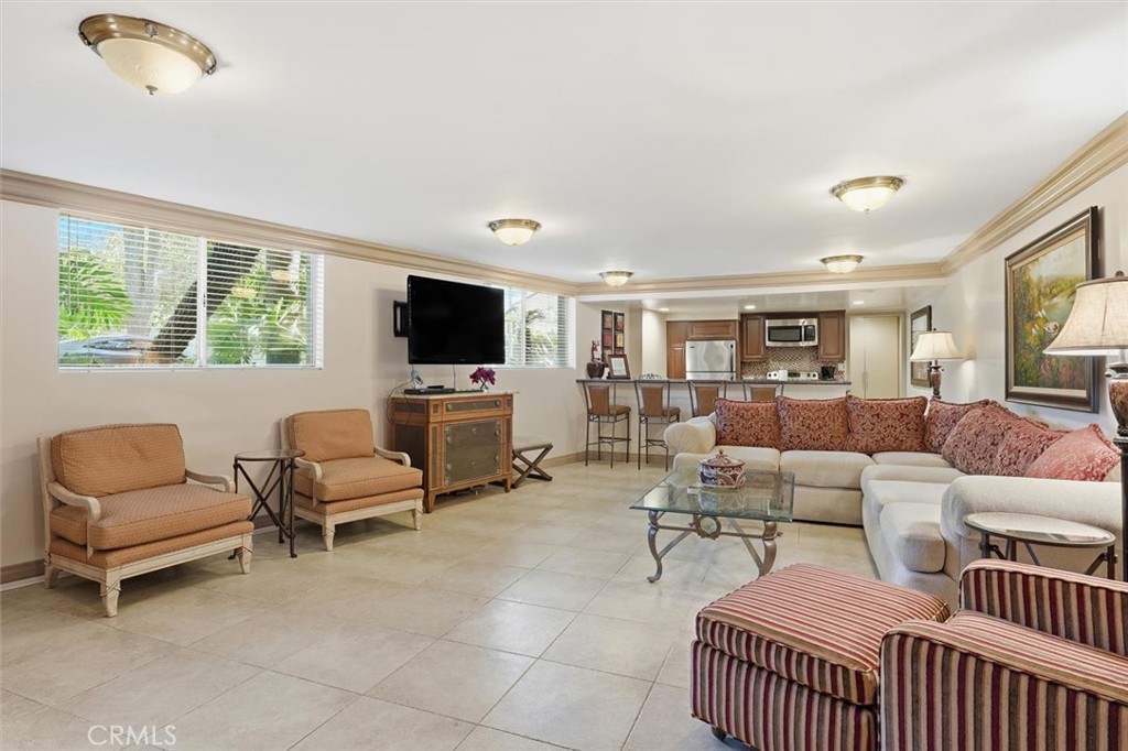 222 7th Street, Unit 202 Santa Monica, CA 90402 - Photo 41 of 41 a living room with furniture and a flat screen tv