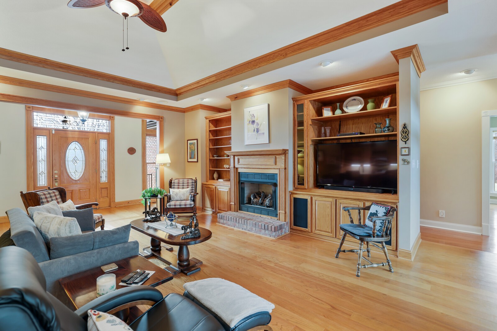 647 Mobley Road Clarksville, TN 37043 - Photo 12 of 69 a living room with furniture a flat screen tv and kitchen view