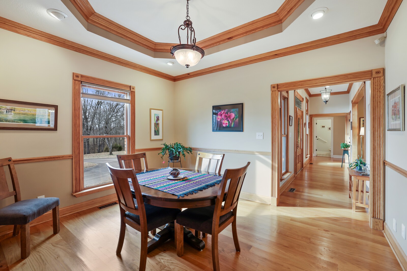 647 Mobley Road Clarksville, TN 37043 - Photo 26 of 69 a view of a dining room with furniture window and wooden floor