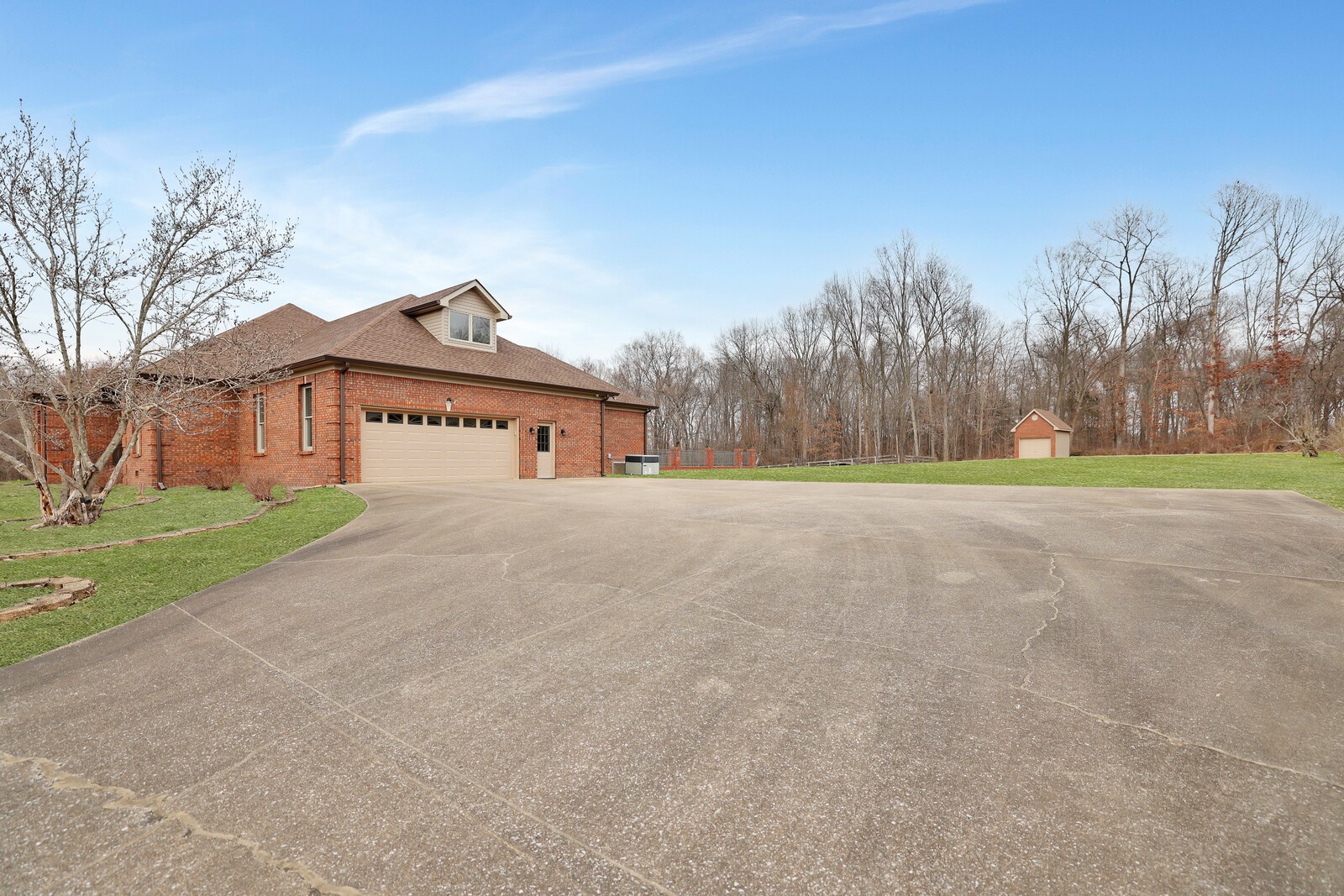 647 Mobley Road Clarksville, TN 37043 - Photo 48 of 69 a front view of a house with a yard and garage