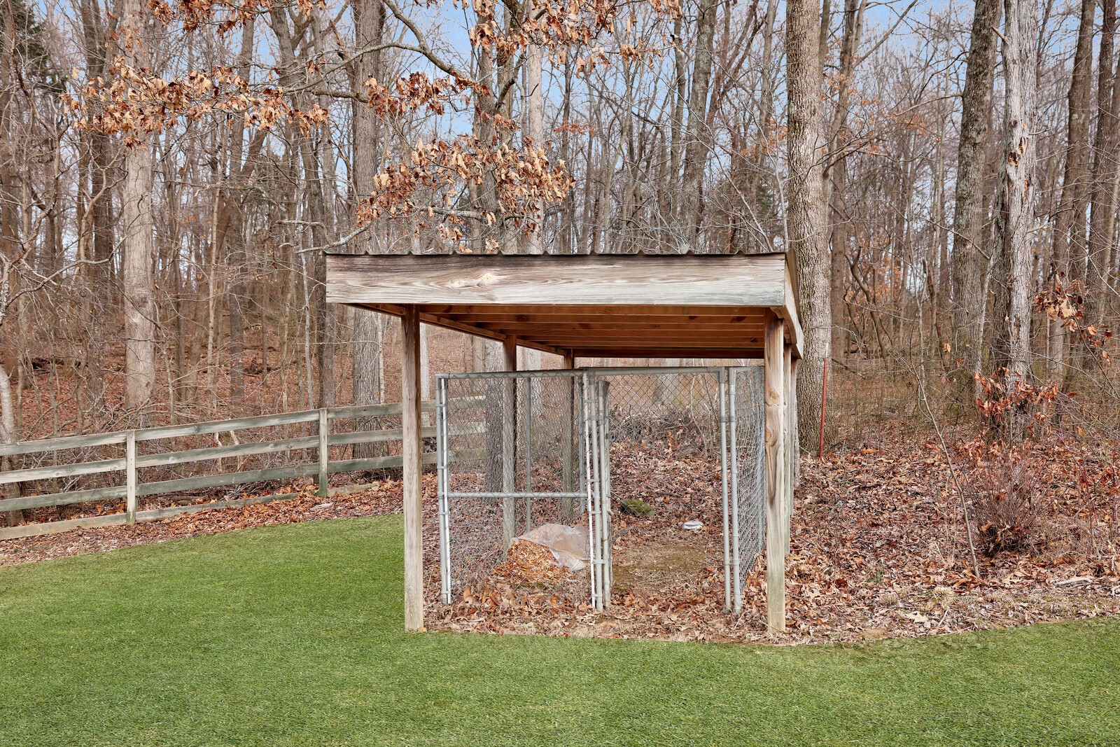 647 Mobley Road Clarksville, TN 37043 - Photo 54 of 69 a view of a wooden fence and trees in the background