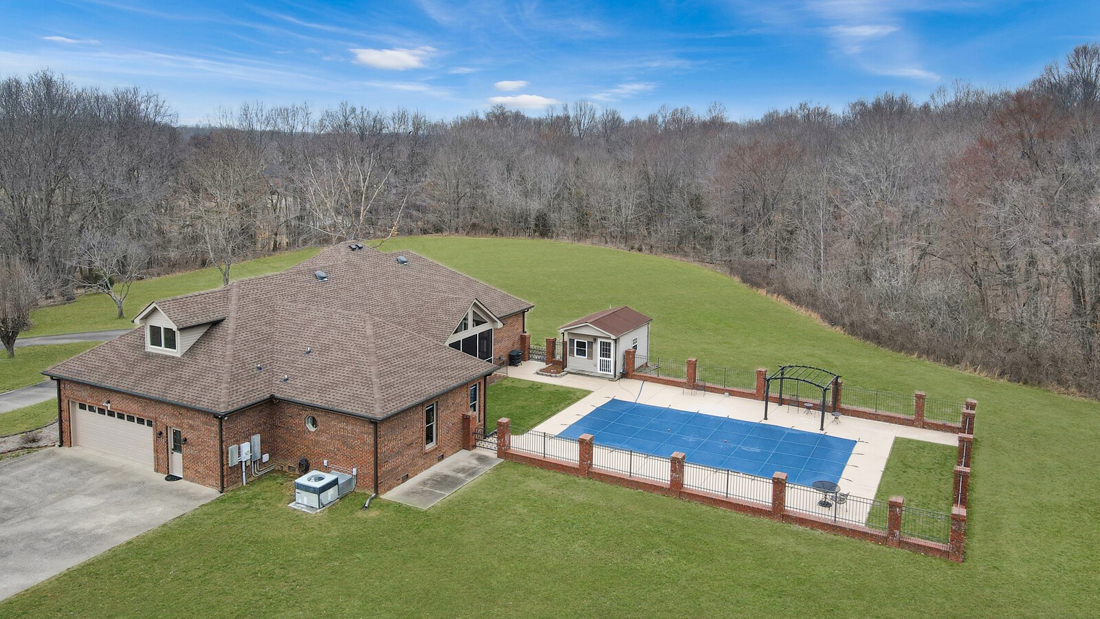647 Mobley Road Clarksville, TN 37043 - Photo 55 of 69 a view of a house with pool and a yard