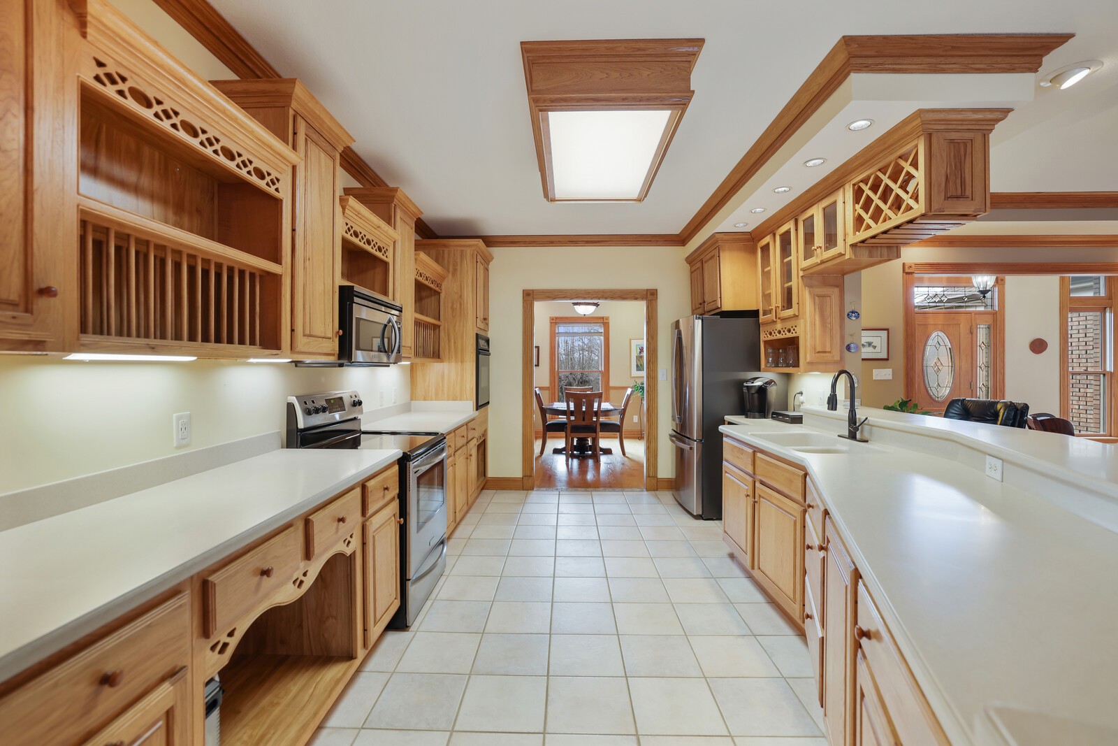 647 Mobley Road Clarksville, TN 37043 - Photo 8 of 69 a large kitchen with stainless steel appliances a stove a sink and a refrigerator