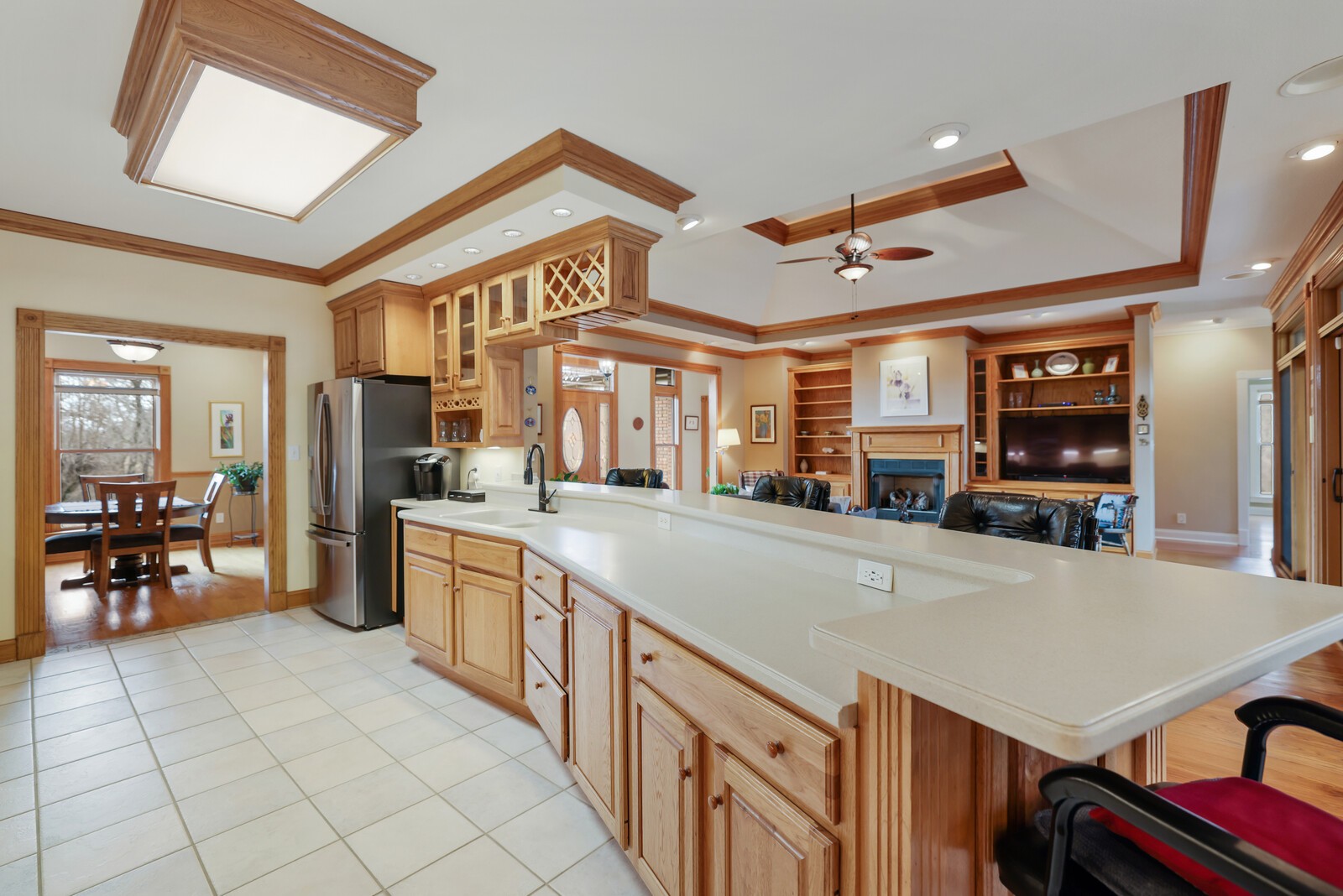 647 Mobley Road Clarksville, TN 37043 - Photo 9 of 69 a large kitchen with stainless steel appliances a stove a table and chairs