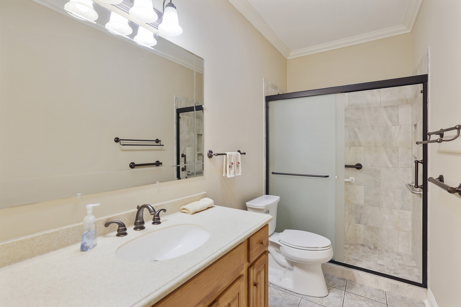 647 Mobley Road Clarksville, TN 37043 - Photo 10 of 69 a bathroom with a sink toilet vanity and shower