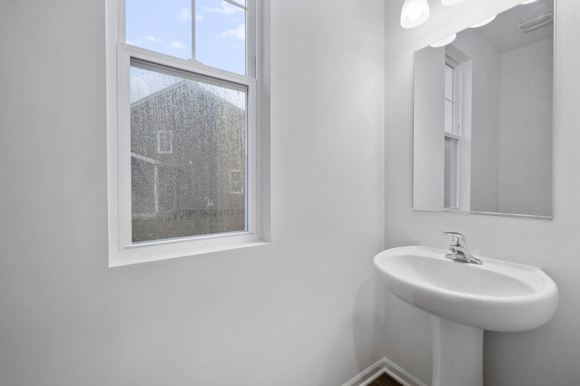 750 Kentshire Circle Elgin, IL 60124 - Photo 14 of 23 a bathroom with a sink and a mirror