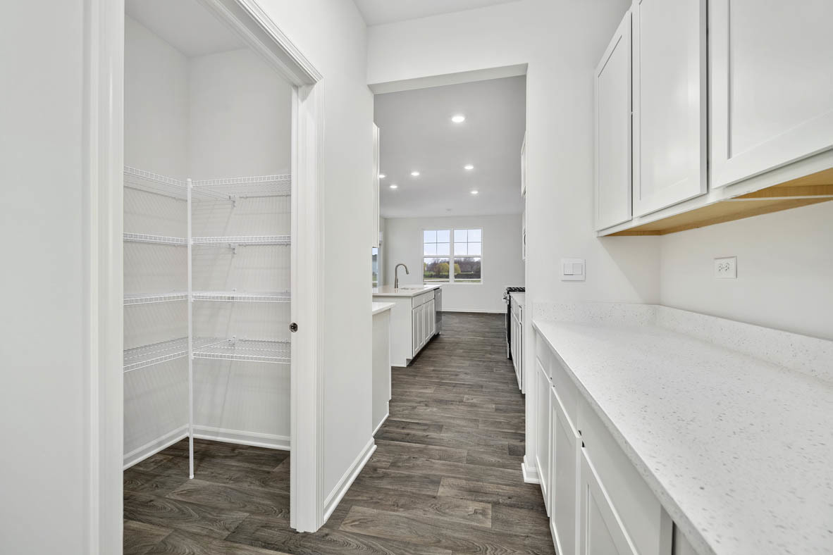 750 Kentshire Circle Elgin, IL 60124 - Photo 5 of 23 a hallway with cabinets