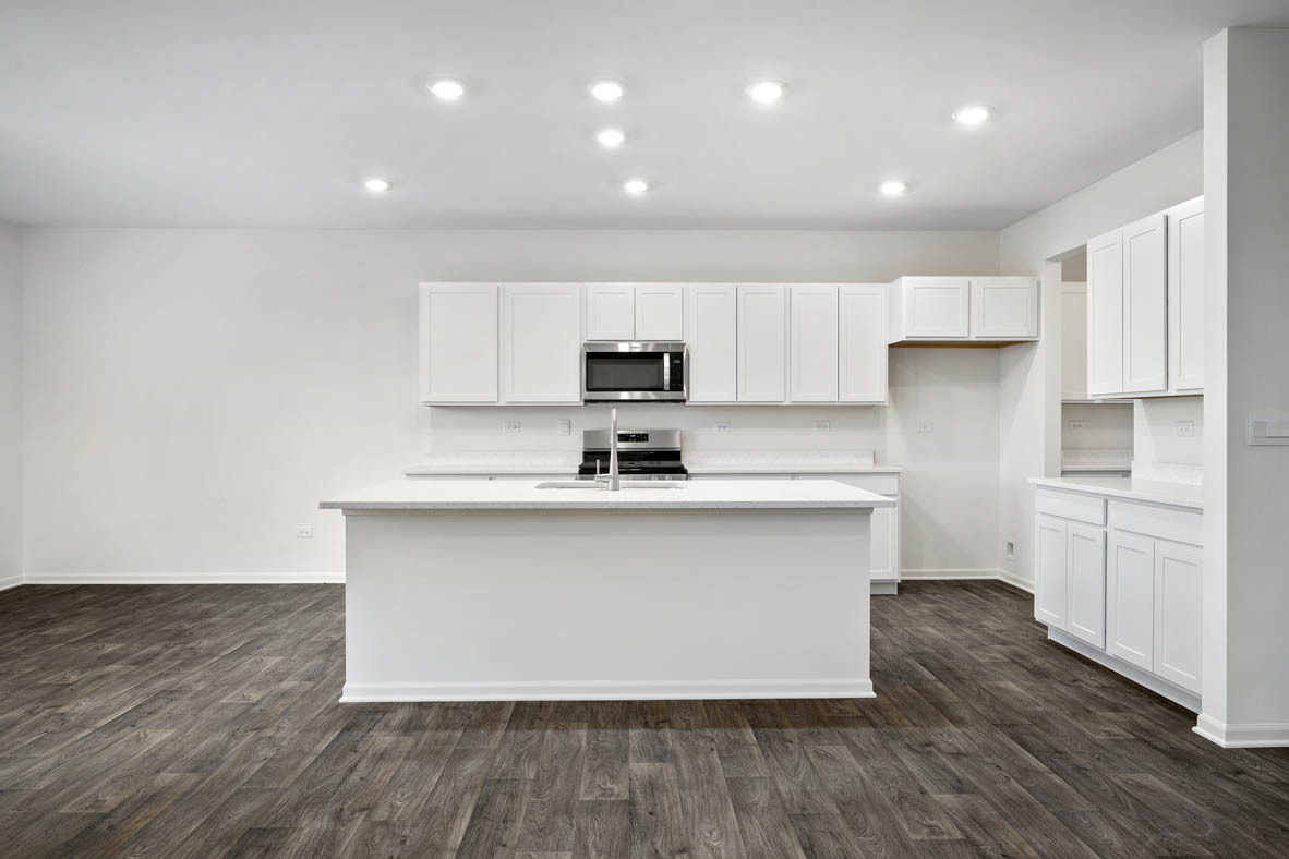 750 Kentshire Circle Elgin, IL 60124 - Photo 7 of 23 a kitchen with wooden floors and appliances