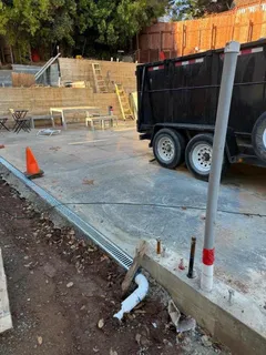 a view of a park with iron fence