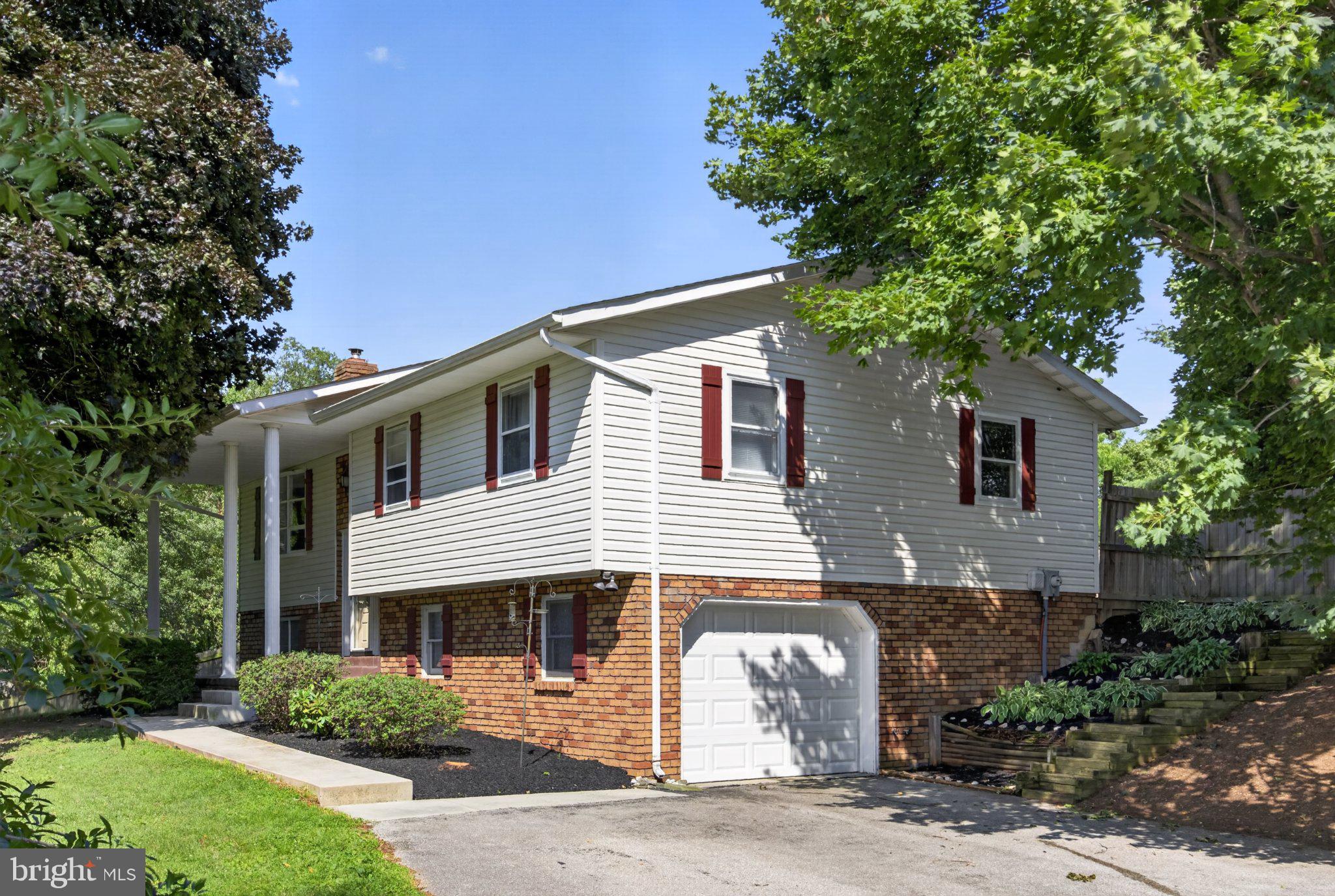 2634 Pleasant Hill Road Hanover, PA 17331 - Photo 2 of 52 Charming split-level home with greenery.