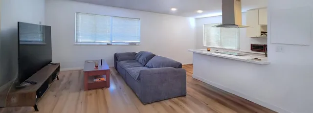 a kitchen with a stove and a microwave