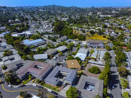 an aerial view of a city with lots of residential buildings