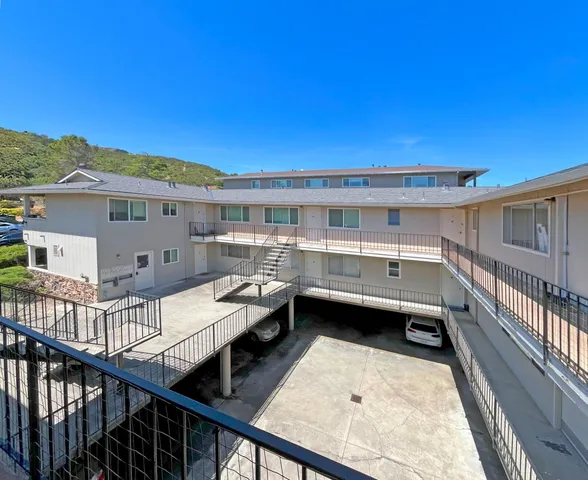 a view of balcony with furniture