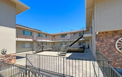 a view of stairs and patio