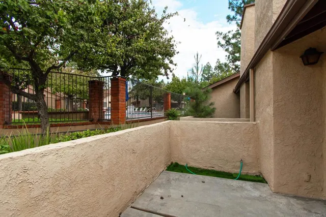 a view of street and small yard
