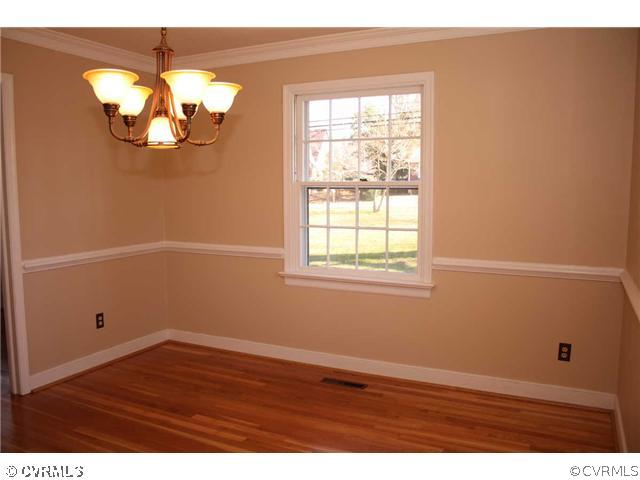 3008 Osborne Road Chester, VA 23831 - Photo 7 of 12 an empty room with a window