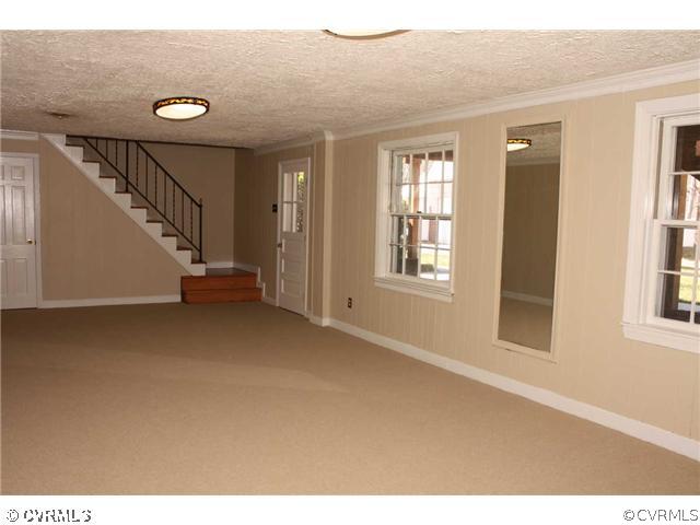3008 Osborne Road Chester, VA 23831 - Photo 9 of 12 a view of an empty room with stairs