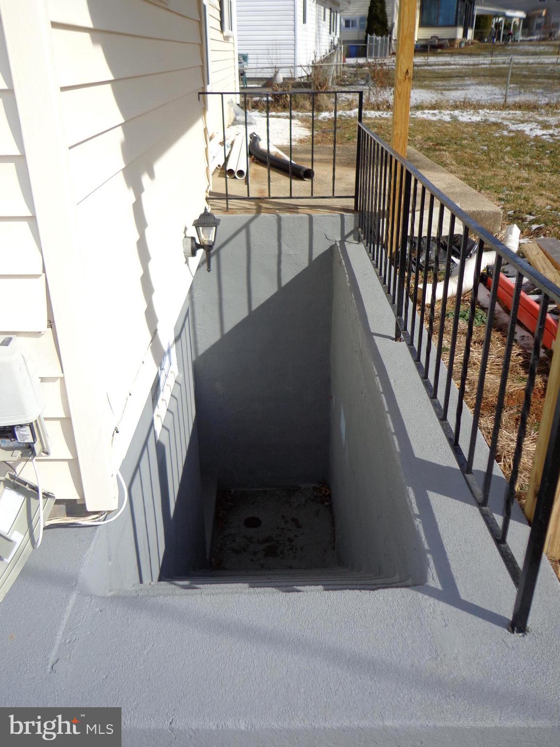 1023 Hartmont Road Baltimore, MD 21228 - Photo 6 of 33 rear basement entrance