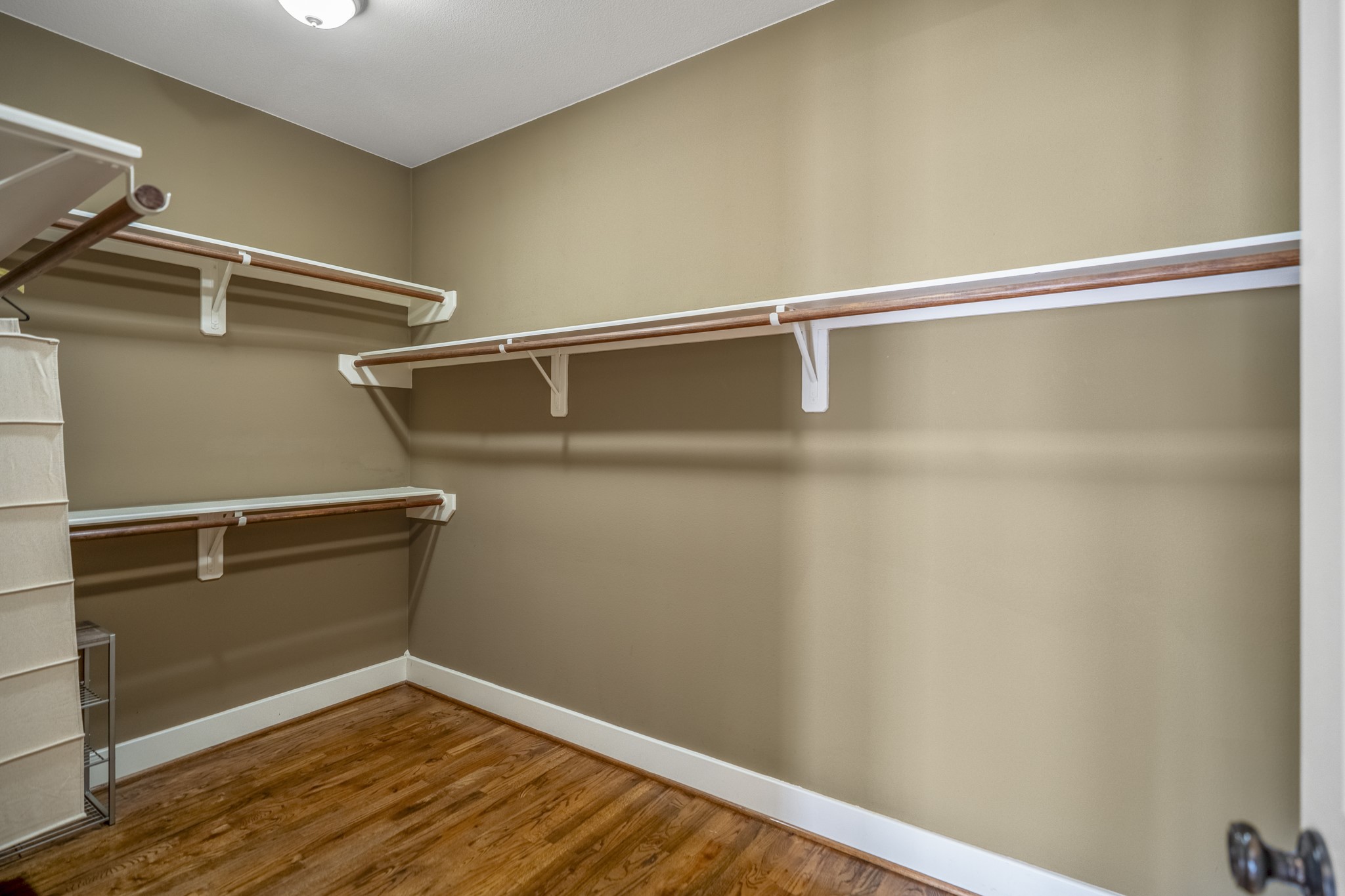 905 West 23rd Street Houston, TX 77008 - Photo 34 of 46 Walk-in primary closet offering generous storage and organization space.