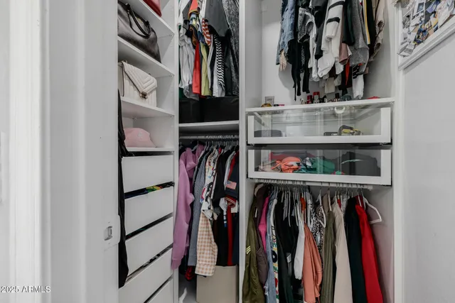 a view of a house with backyard and porch