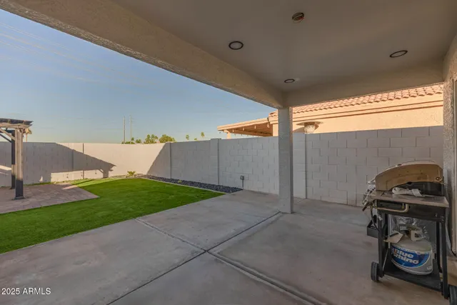 an aerial view of a house with a garden