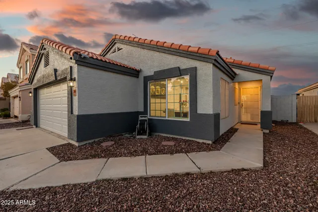 a view of a livingroom with furniture and a flat screen tv