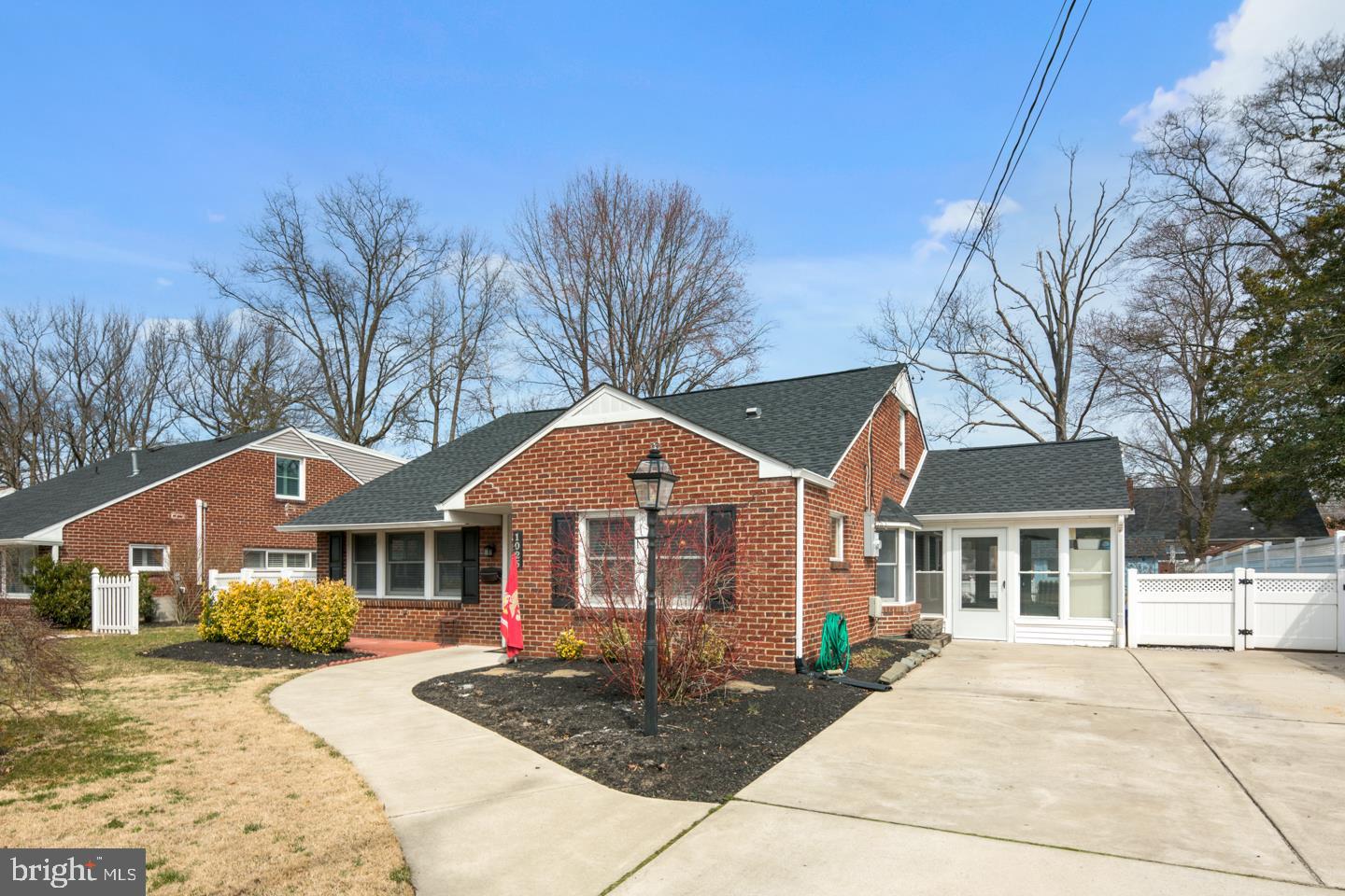 1025 Chesterfield Road Barrington, NJ 08033 - Photo 2 of 32 a front view of a house with a yard