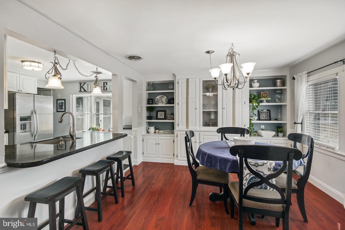 1025 Chesterfield Road Barrington, NJ 08033 - Photo 15 of 32 a view of a dining room with furniture and wooden floor