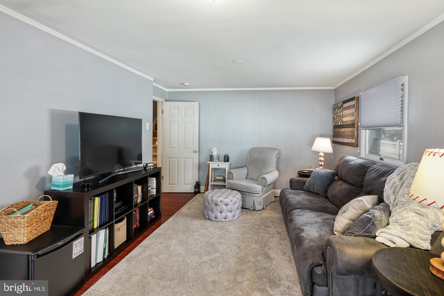 1025 Chesterfield Road Barrington, NJ 08033 - Photo 18 of 32 a living room with furniture and a flat screen tv
