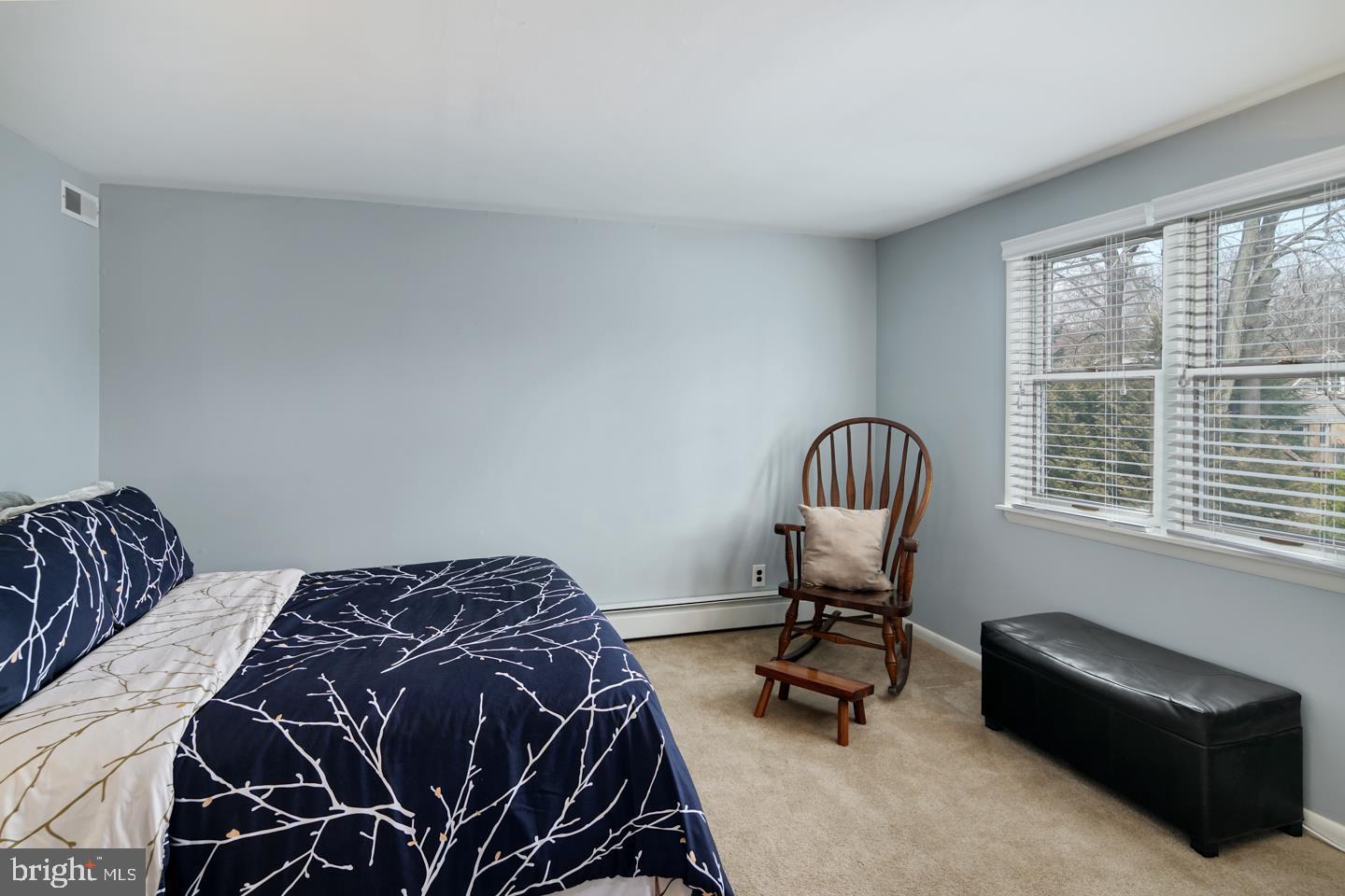 1025 Chesterfield Road Barrington, NJ 08033 - Photo 28 of 32 a bedroom with a bed chair and a window
