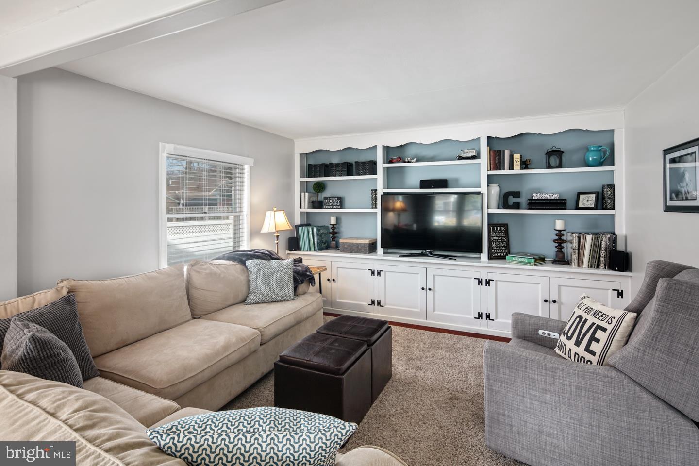 1025 Chesterfield Road Barrington, NJ 08033 - Photo 7 of 32 a living room with furniture and a flat screen tv