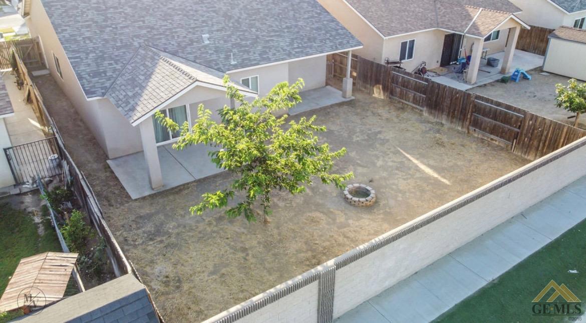 Undisclosed Address Wasco, CA 93280 - Photo 20 of 28 a view of a house with a porch