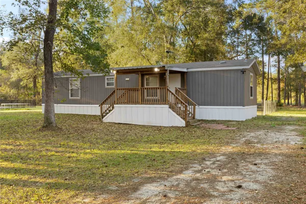 a house view with a garden space