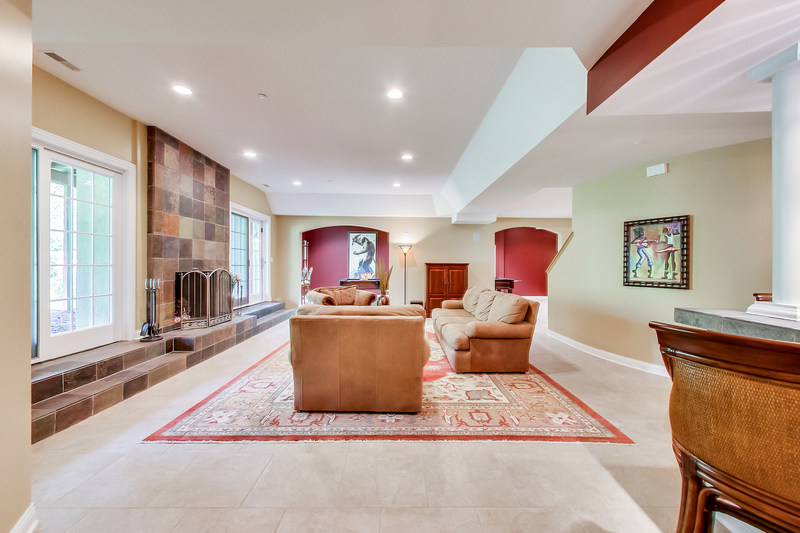 4289 Hilltop Road Long Grove, IL 60047 - Photo 26 of 42 a living room with furniture a flat screen tv and a fireplace