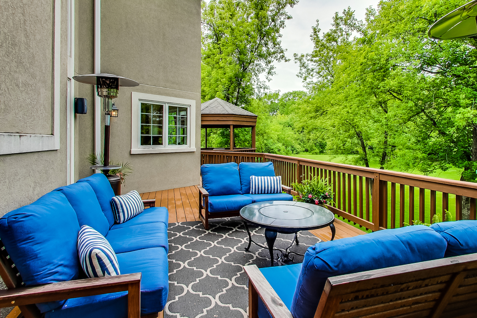4289 Hilltop Road Long Grove, IL 60047 - Photo 34 of 42 a balcony with furniture and a potted plant