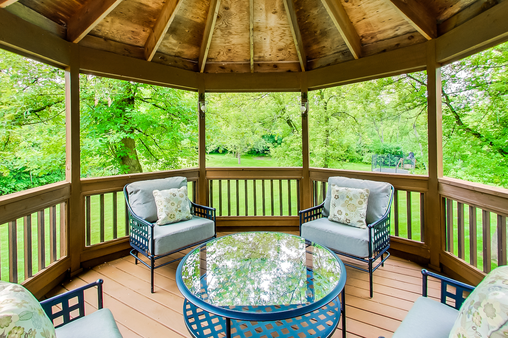 4289 Hilltop Road Long Grove, IL 60047 - Photo 36 of 42 a view of a chair and table in the balcony