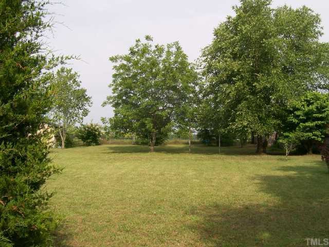 9373 Glover Road Bailey, NC 27807 - Photo 2 of 2 a view of a yard with a trees