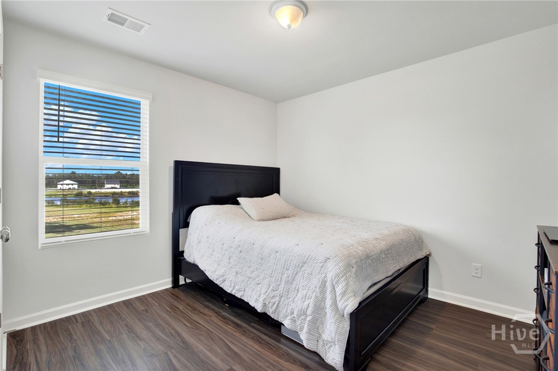690 Wilkins Road Midway, GA 31320 - Photo 20 of 31 Upstairs bedroom