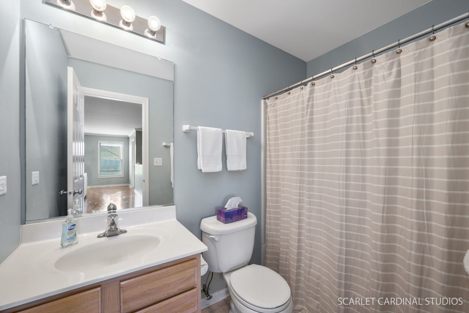 3214 Marbill Farm Road Montgomery, IL 60538 - Photo 18 of 27 a bathroom with a sink a toilet and a mirror