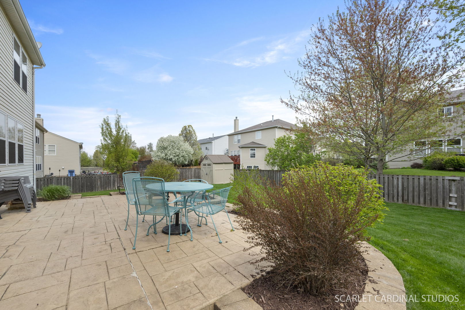 3214 Marbill Farm Road Montgomery, IL 60538 - Photo 22 of 27 a view of a patio with a table chairs and a yard