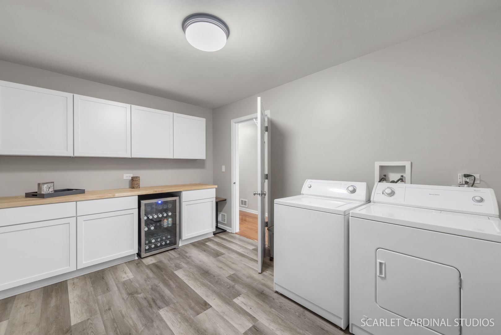 3214 Marbill Farm Road Montgomery, IL 60538 - Photo 8 of 27 a kitchen with cabinets and wooden floor