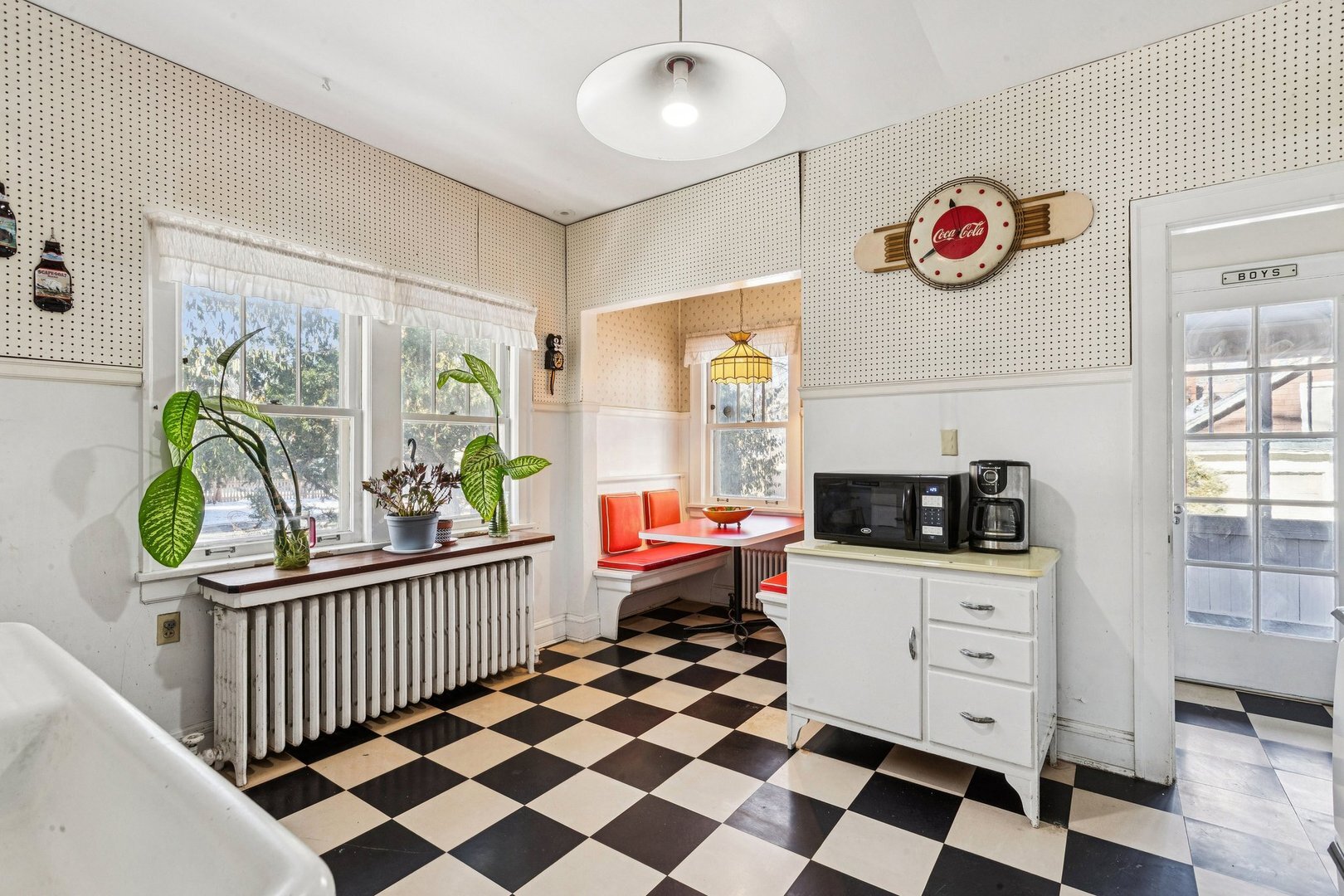 1201 Noyes Street Evanston, IL 60201 - Photo 13 of 50 a kitchen with a stove a sink and a microwave