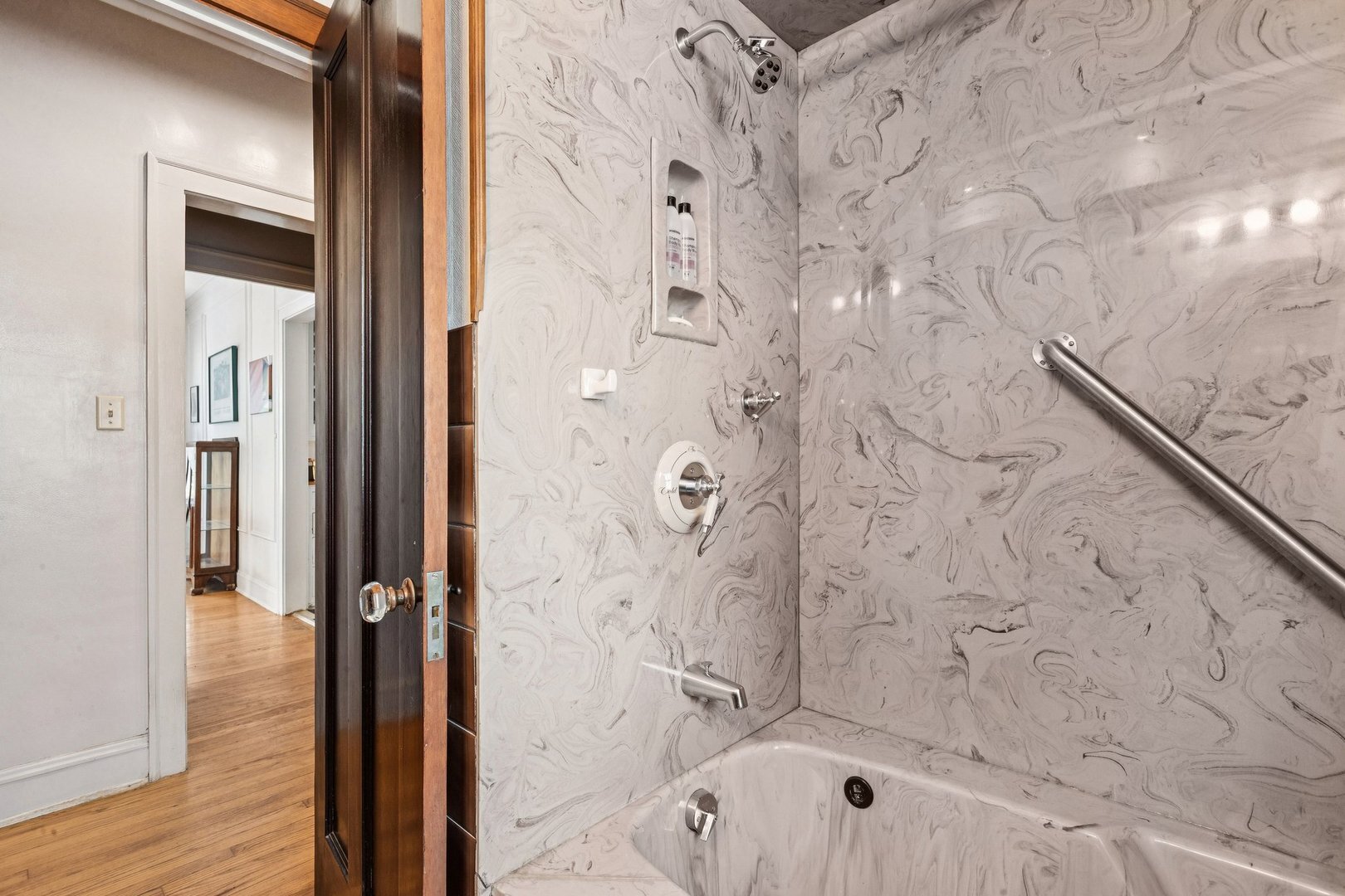 1201 Noyes Street Evanston, IL 60201 - Photo 22 of 50 a bathroom with a bathtub and shower