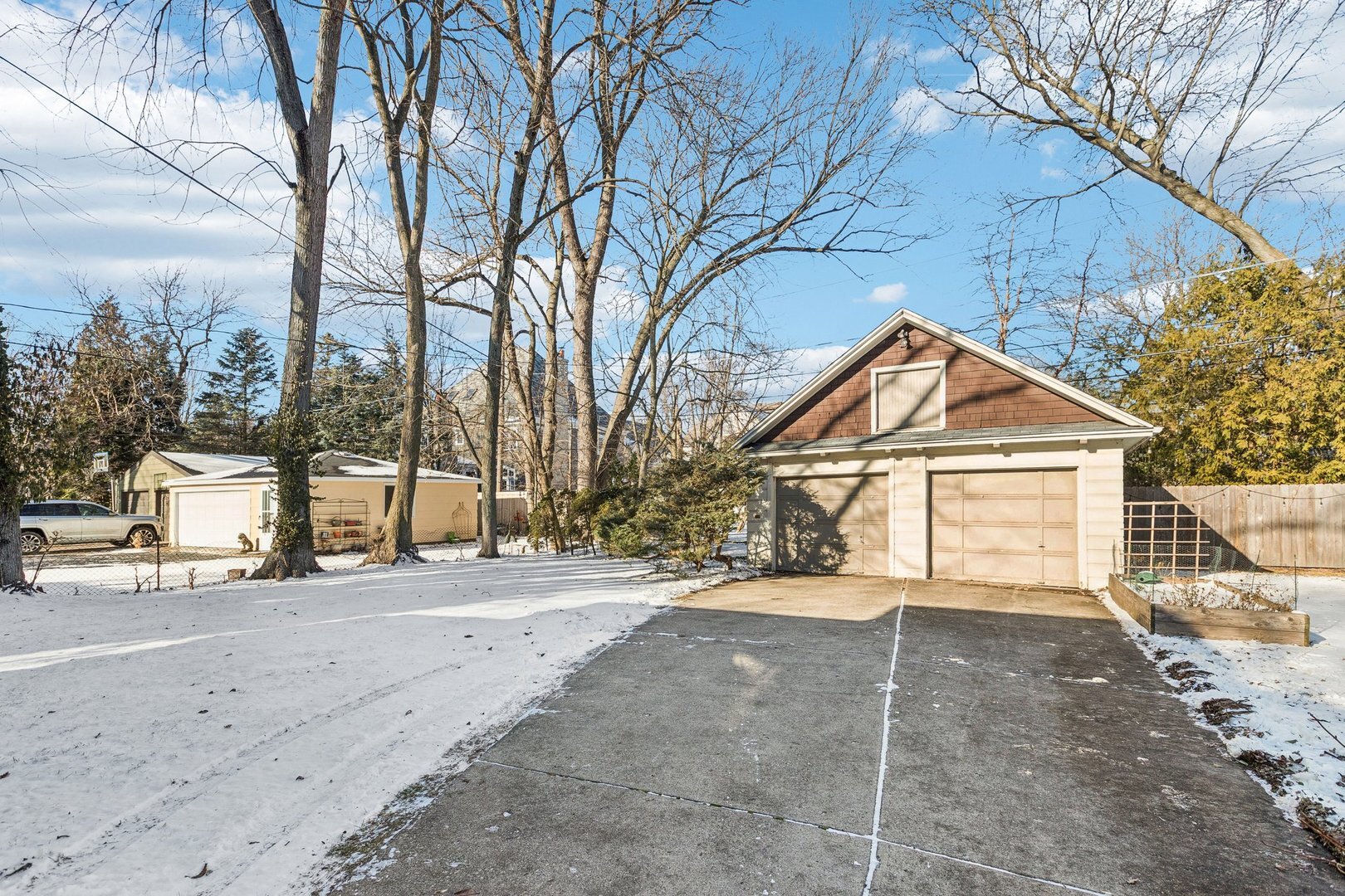 1201 Noyes Street Evanston, IL 60201 - Photo 43 of 50 a view of a house with a yard covered in snow
